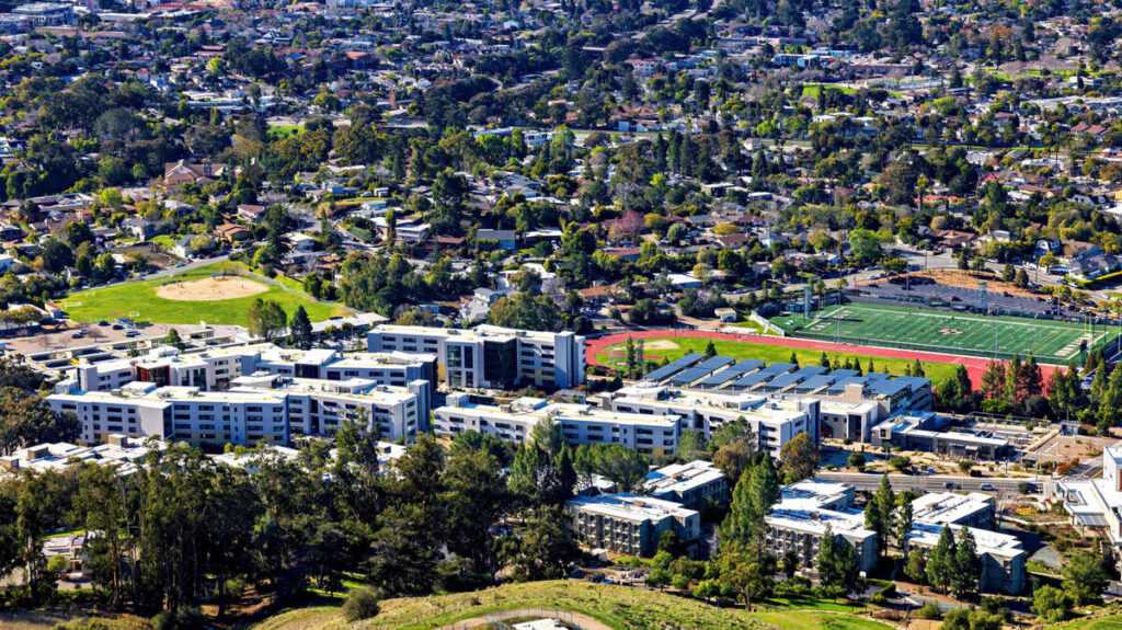 Aerial view of Cal Poly campus housing and athletic fields in San Luis Obispo.